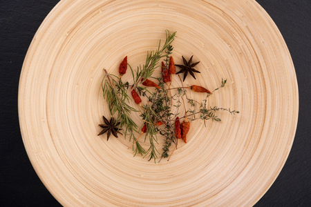 Deep plate with mix of spices and herbsの写真素材