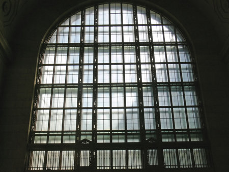 Ornate art deco window, in a train station.