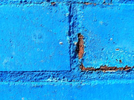 Colorful bits of a city - blue painted bricks.の写真素材