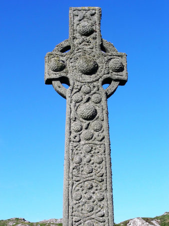 The ancient cross of St. Martin which has stood outside the Church of St. Columba on the Isle of Iona, Scotland, for more than 1000 years.          の写真素材