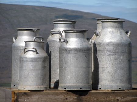 A bunch of milk bottles waiting for collection outside a farm in western Iceland.                               の写真素材