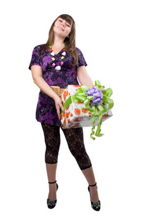 The young beautiful girl with a gift box on a white backgroundの写真素材