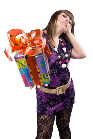 The young beautiful girl with a gift box on a white backgroundの写真素材