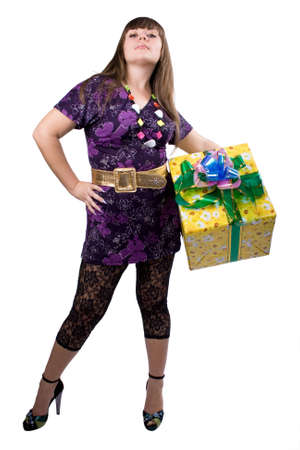 The young beautiful girl with a gift box on a white backgroundの写真素材