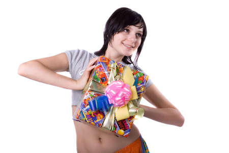 The young beautiful girl with a gift box on a white backgroundの写真素材