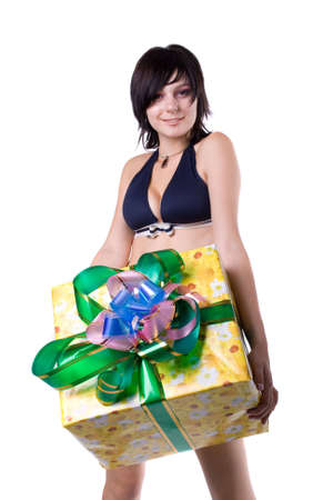 The young beautiful girl with a gift box on a white backgroundの写真素材