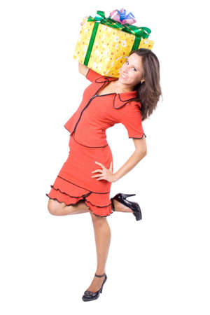 The young beautiful girl with a gift box on a white backgroundの写真素材