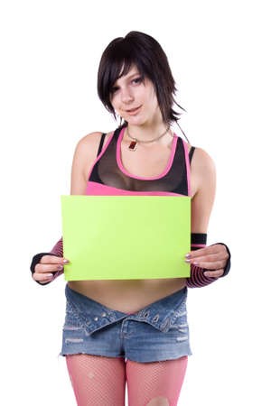 The young beautiful businesswoman at office behind work on a white backgroundの写真素材