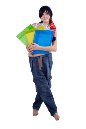 The young beautiful businesswoman at office behind work on a white backgroundの写真素材