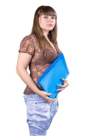 The young beautiful businesswoman at office behind work on a white backgroundの写真素材