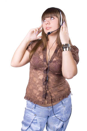 The young beautiful businesswoman at office behind work on a white backgroundの写真素材