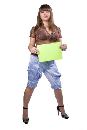 The young beautiful businesswoman at office behind work on a white backgroundの写真素材