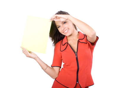 The young beautiful businesswoman at office behind work on a white backgroundの写真素材