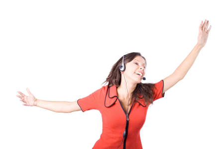 The young beautiful businesswoman at office behind work on a white backgroundの写真素材