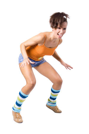 The young girl engaged in fitness on a white backgroundの写真素材