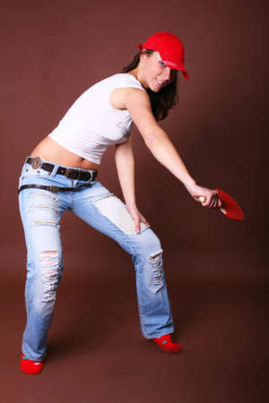 The young girl engaged in fitness on a backgroundの写真素材