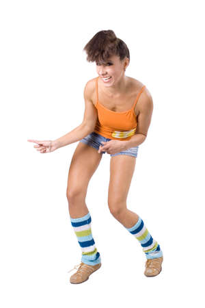 The young girl engaged in fitness on a white backgroundの写真素材