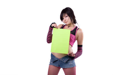 The young beautiful businesswoman at office behind work on a white backgroundの写真素材