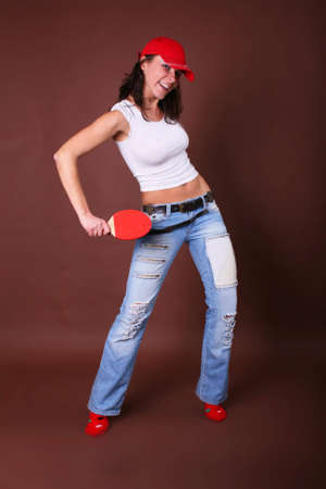 The young girl engaged in fitness on a backgroundの写真素材