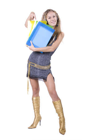 The young beautiful businesswoman at office behind work on a white backgroundの写真素材