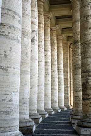 two rows of massive marble pillars lined up roundishlyの写真素材