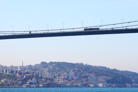 very long Fatih-Sultan-Mehmet suspension bridge connecting Asia with Europe above the Bosporus near Istanbul, Turkeyの写真素材