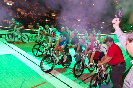 ZURICH-NOV. 30:  Professional athletes start a race at indoor bike challenge Sixday-Nights Zürich 2011 at Zurich Hallenstadion November 30, 2011 in Zurich SUI. のeditorial素材