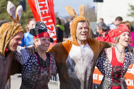 THUN-MARCH. 11 2012: Unidentified runners many in costumes participate in the Fisherman's Friend Strongman run in Thun SUI. It consists of 16 km and of 43 obstacales to be passed by all 4000 runners.のeditorial素材