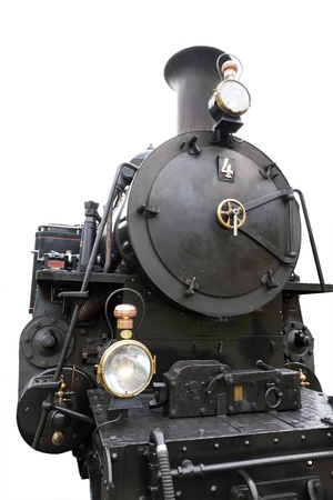 vintage black steam powered railway train close up isolated on whiteのeditorial素材