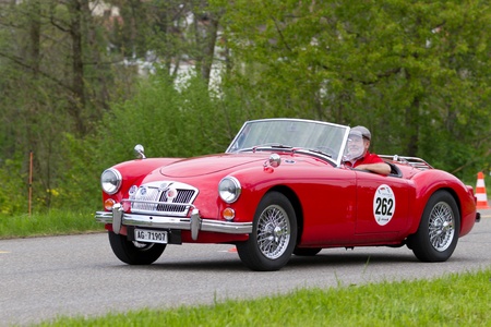 MUTSCHELLEN, SWITZERLAND-APRIL 29: Vintage car MG MGA 1600 from 1959 at Grand Prix in Mutschellen, SUI on April 29, 2012.  Invited were vintage sports cars and motorbikes.のeditorial素材