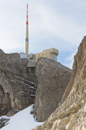  top of 2501 m high Mmountain Saentis with station and antenna on rocky ground, Switzerlandの写真素材
