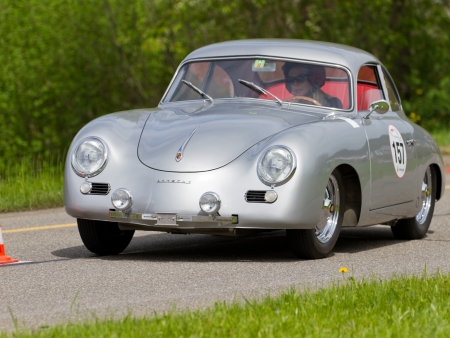 MUTSCHELLEN, SWITZERLAND-APRIL 29: Vintage race touring car Porsche 356 PRE-A from 1954 at Grand Prix in Mutschellen, SUI on April 29, 2012.  Invited were vintage sports cars and motorbikes.のeditorial素材