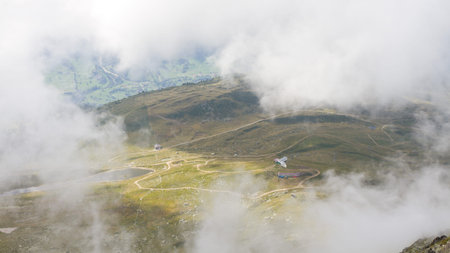 aerial view through the clouds on a mountain station, Switzerland