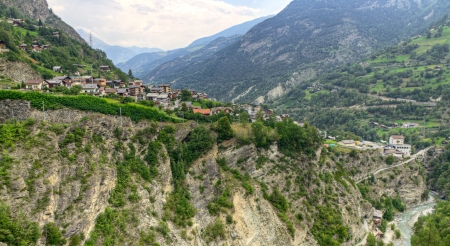 town Stalden Saas situated over river Saaser Vispa on a cliff in the valley, Valais, Switzerlandの写真素材