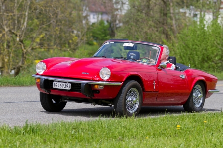 MUTSCHELLEN, SWITZERLAND-APRIL 29: Vintage race touring car Triumph Spitfire GT6 MK III from 1971 at Grand Prix in Mutschellen, SUI on April 29, 2012.  Invited were vintage sports cars and motorbikes.のeditorial素材
