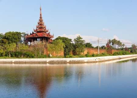 A bastion at of the wall surrounding Mandalay Palace, surrounded by a moat in Mandalay, Burmaのeditorial素材