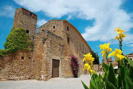 Peratallada, Costa Brava, Cataonia, Spain  view from famous square with flowersの写真素材