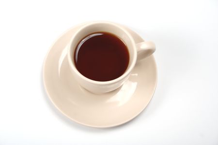 Bright cup full of strong tea isolated on white background.の写真素材