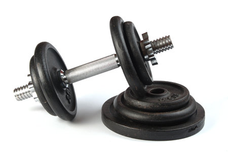 Old dirty dumbbells isolated on white background.の写真素材