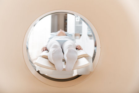 Medical CT or MRI Scan with a patient in the modern hospital laboratory. Interior of radiography department. Technologically advanced equipment in white room. Magnetic resonance diagnostics machineの写真素材