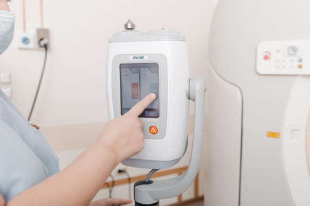 Medical CT or MRI Scan in the modern hospital laboratory. Interior of radiography department. Technologically advanced equipment in white room. Magnetic resonance diagnostics machineの写真素材