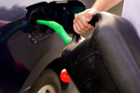 refueling gas with a fuel canisterの写真素材