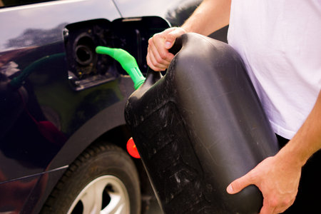 refueling gas with a fuel canisterの写真素材