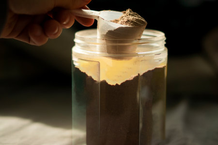 a scoop of chocolate whey proteinの写真素材