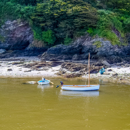 River Beach With Boats