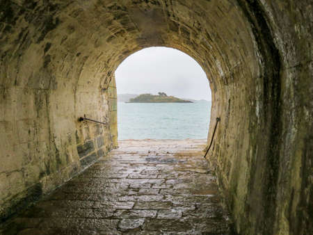 Old Tunnel With Sea View Of Islandの写真素材