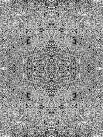 Textured grunge black-white pattern. Abstract symmetric background, kaleidoscope effect. For tech design of leaflets, posters, covers, wallpapers, websites, textileの写真素材