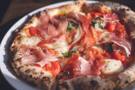 Pizza Margherita with Prosciutto at Stylish Italian Restaurant - Hakodate, Hokkaidoの写真素材