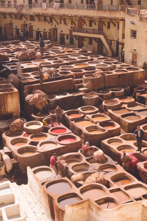 Tannery in the Old City of Fez, a World Heritage Site in Morocco - a traditional tannery and dyeing...