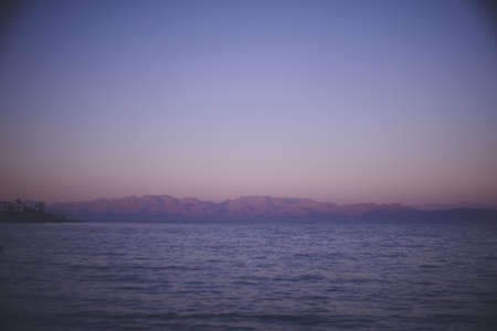 Dusk at Dahab, a diving resort in the Red Sea, Sinai Peninsula, Egyptの写真素材